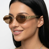 Isya | Small Oval Sunglasses With Metal Frame Detail