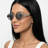 Isya | Small Oval Sunglasses With Metal Frame Detail